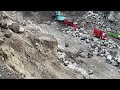 Sand mining,Cutting cliffs with a Kobelco SK 200 excavator in a sand mine