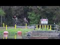 Florida man's airboat going over a dam on the Withlacoochee River