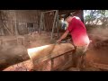 Wood Processing Process Inside the factory, wood is processed into a very large table