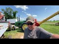 John Deere 40 and S680 Combines Harvesting Wheat