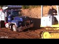 A powerful truck got stuck in mud!  Cargo transportation off-road is a challenge for drivers.