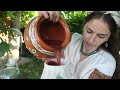 A lot of work in village! Ukrainian woman is  making traditional cherry drink 