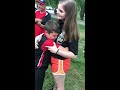 Army sister surprises little brother at ballgame