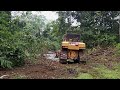 Excellent CATERPILLAR BULLDOZER D6R XL works to make a way across a big river