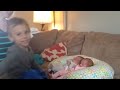 Brother meets triplet siblings for the first time! 2 in the video, 3rd came home two days later.