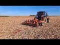 New Holland t7205 com subsolador Kuhn patinando com 47cm profundidade