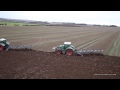 Three Tractors Ploughing Together