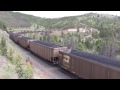 SD70MAC led coal train climbs Mullan Pass