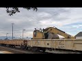 Amtrak 777 and Union Pacific work train heading north