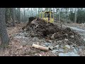 Clearing land with a dozer