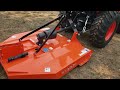 Bought a Kioti CK2610 HST tractor with KG4066 root grapple and titan rotary cutter