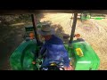 Tractor trabajando en el Campo con Empacadora John Deere