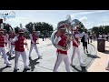 The Magic Kingdom band plays Disney songs in front of Cinderella's Castle