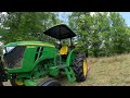 Bush hogging an Overgrown Yard with the JD 5045E