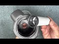 Vacuum repair man shows how to clean the Miele triflex dirt cup assembly and filter