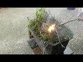Trimming weeds with 4400 Volts AC