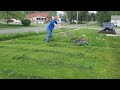 raw footage of mowing a overgrown lawn