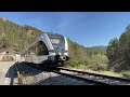 Trens de Lleida: RL2. Stadler 311 sortint del túnel de Vilanova de Sal.