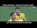 Drew Mitchell mic'd up with earpiece for banter with commentators