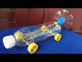 Cómo hacer un coche con botellas de plástico | Banda elástica coche accionado