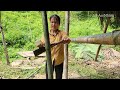 17 year old single mother perfects her kitchen using bamboo and palm leaves