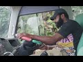 Highland bus driver.. driving kiunga tabubil Highway Papua New Guinea