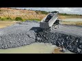 Good action Bulldozer komatsu push stone into water Build Road in lake with wheel 12 Truck