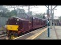 Jolly whistler train passing Stockport