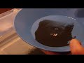 Cleaning fine gold from black sands.  Method #2 (Tapping the gold pan)