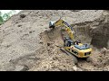 Huina 1580 working in the sand