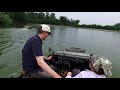 A Schwimmwagen enters a small lake in northern Italy.