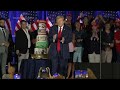 Trump fans mark his 78th birthday in Florida with a giant ‘MAGA’ layer cake and pledges of loyalty