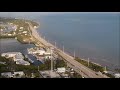 Wireless Tech Drone Footage Monopole Islamorada Florida. Top ATT Middle Tmobile Bottom Verizon.