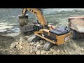 Caterpillar 385C Excavator Loading Trucks And Caterpillar Dumpers - Kivos Ate