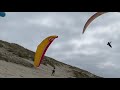 Progression as a kitesurfer soaring in the dunes with paraglider