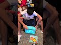 Thomas opening gifts he received from his Amazon Wishlist