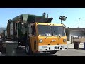 2 Valley Vista Services trucks doing trash
