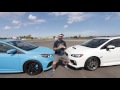 TRACK BATTLE! Ford Focus RS vs Subaru WRX STI