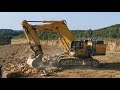 Komatsu PC1250 loading HD605 and breaking blocks