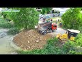 Nice Showing Action! Filling Up The Land huge, Bulldozer KOMATSU DR51PX, Dump Truck Unloading