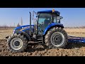 Ploughing with 100 HP Tractor. New Holland TD100D