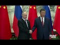 Xi hugs Putin as Russia-China talks sealed with rare show of affection