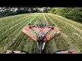 Mowing a hay field full of weeds, and sage.