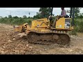 KOMATSU Dozer D21P Pushing Stone