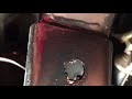 Drilling Drain Holes in a Jeep Wrangler Frame to Prevent Rust and Rot