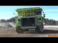 4K| Komatsu PC1250 Loading 2x Euclid R130 Dumpers With Rocks In A Quarry