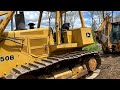 Cleaning our land of trees and stumps with a Bulldozer