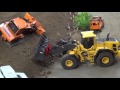 RC Dozer Komatsu D65WX stuck at the landfill. Rescue Mission