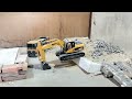 Remote Control Excavator In Action At The 1550 Land Garage!,RC-HUINA