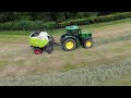 Rowing up and Baling with John Deere tractors, Part One.